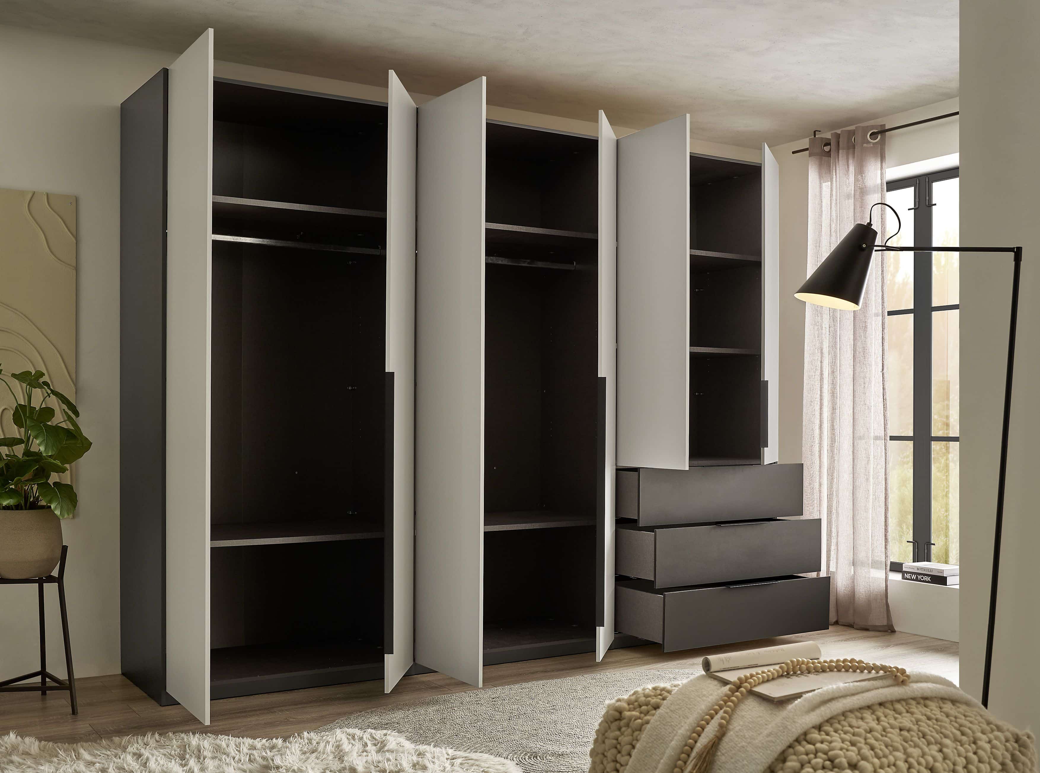 Nuka Kleiderschrank graphitgrau/hellgrau – 300 cm breit, mit Schubladen & Drehtüren, modernes Design Nuka Kleiderschrank graphitgrau/hellgrau – 300 cm breit, mit Schubladen & Drehtüren, modernes Design