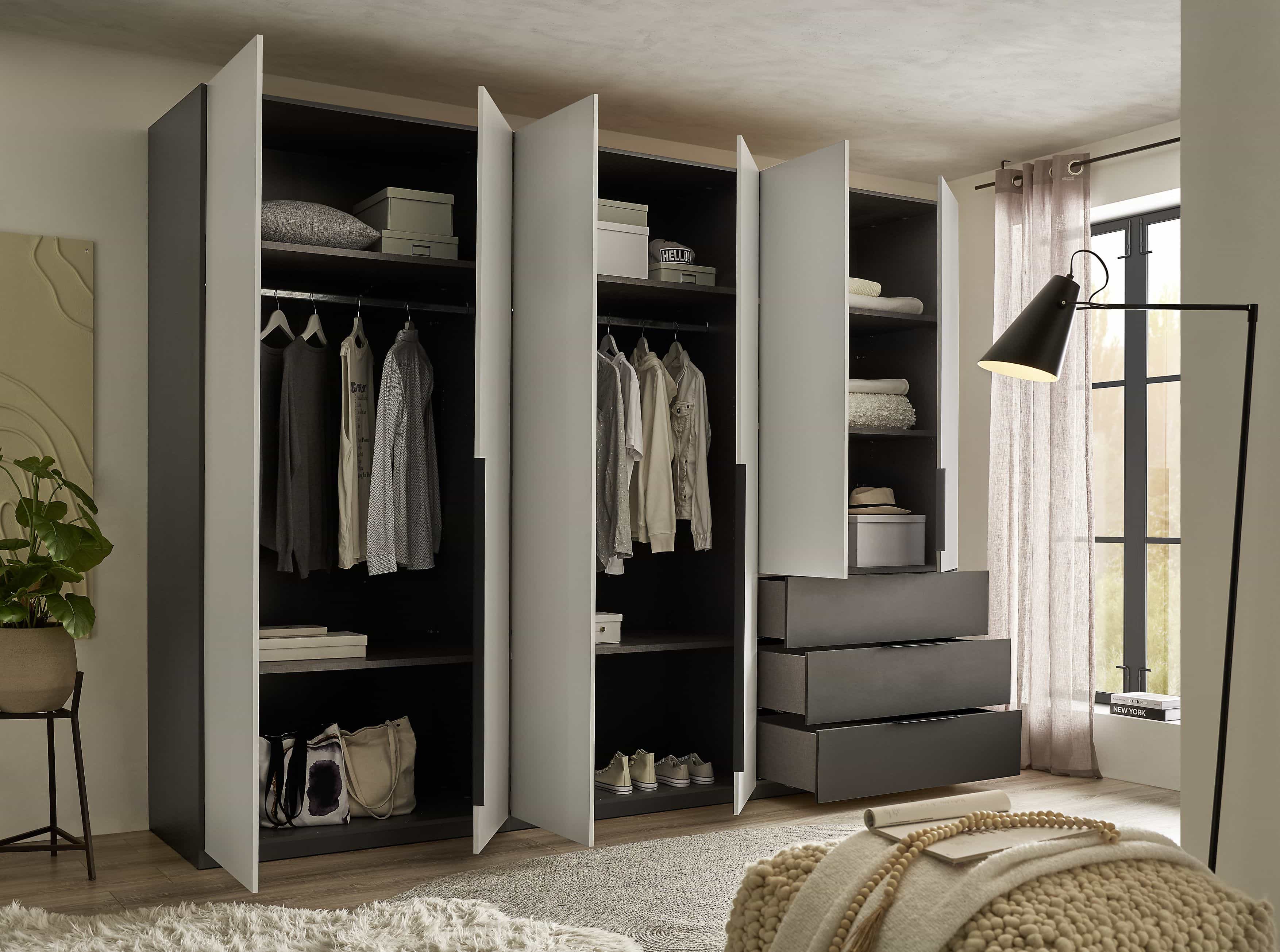 Nuka Kleiderschrank graphitgrau/hellgrau – 300 cm breit, mit Schubladen & Drehtüren, modernes Design Nuka Kleiderschrank graphitgrau/hellgrau – 300 cm breit, mit Schubladen & Drehtüren, modernes Design